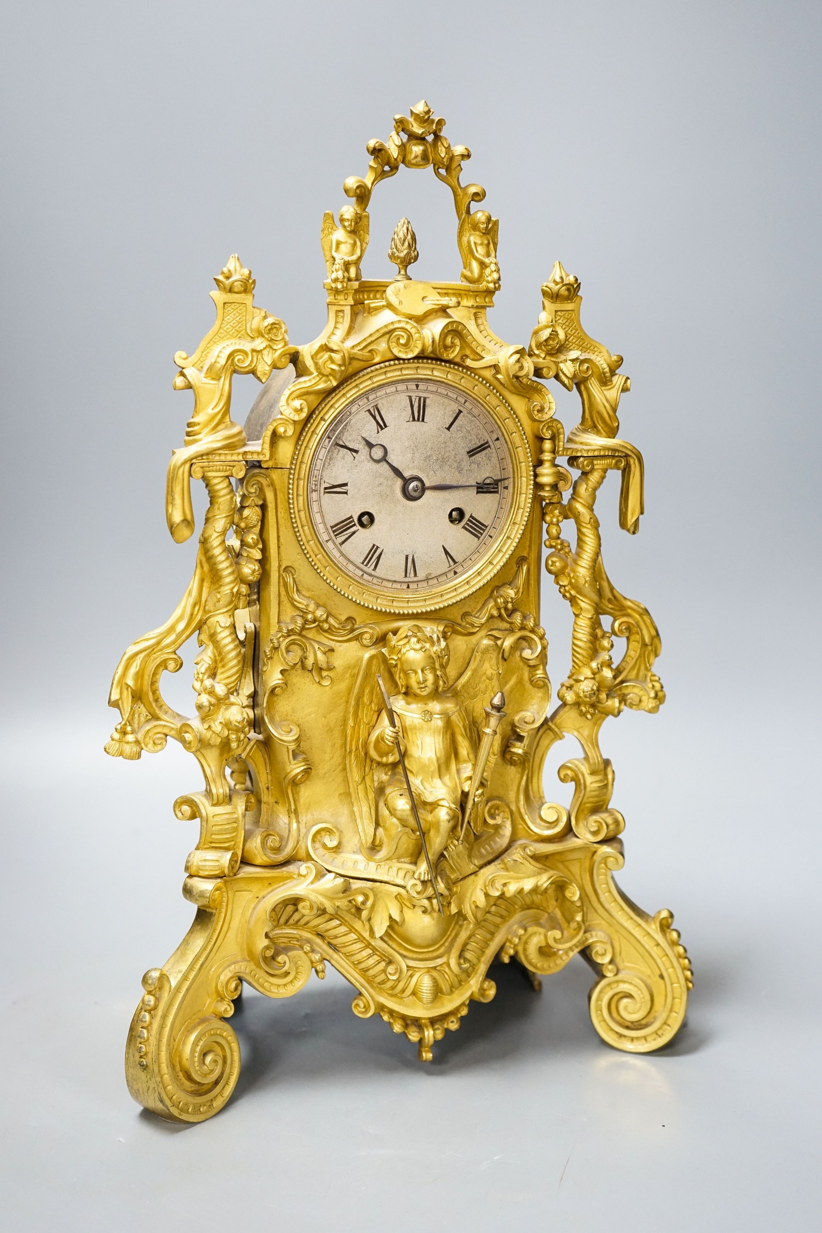 A 19th century French ormolu mantel clock, mounted with an angel, 39cm